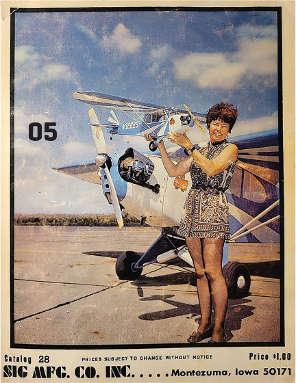 Woman holding model plane in front of real biplane, smiling, catalog cover.