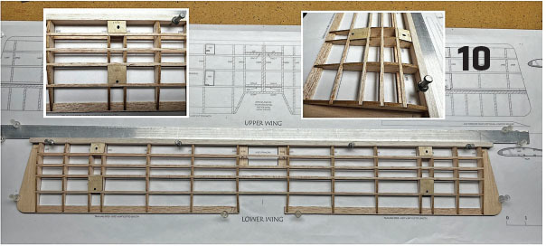 Model airplane wing frame on blueprint, with two close-ups of wooden structure.