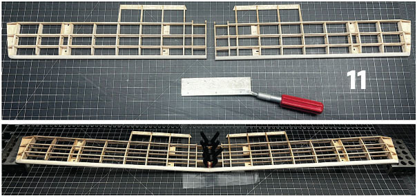 Wooden model airplane wings on grid paper with a metal tool and the number 11.