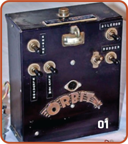 Vintage electronic device with switches, labeled "Orbit" and "01."