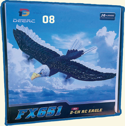 RC eagle model with black wings on cloudy sky; text: "FX651, RTF 2-CH RC Eagle."