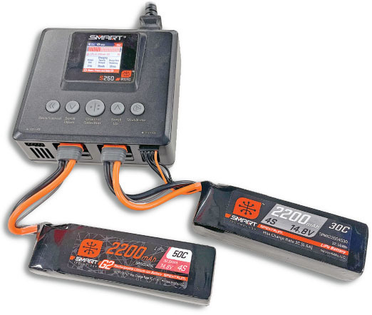Smart battery charger with two orange-wired 2200mAh LiPo batteries.