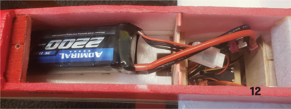 Battery pack labeled "Admiral 2200" in a red foam compartment.