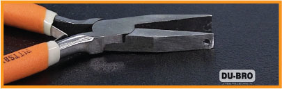 Pliers with orange handles on a black surface, DU-BRO logo in the corner.