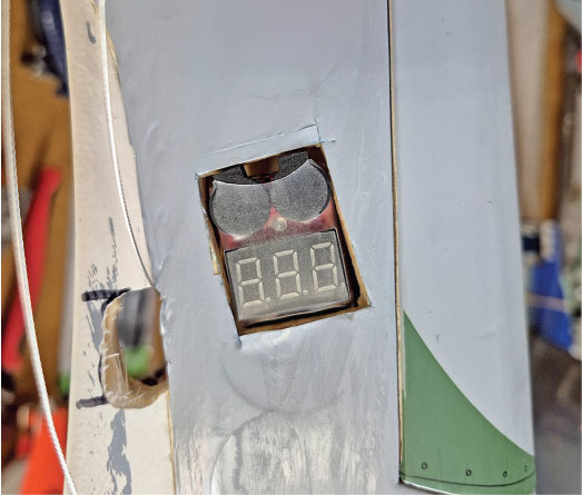 Metal surface with electronic display showing "8.8.8.” with a clear panel.