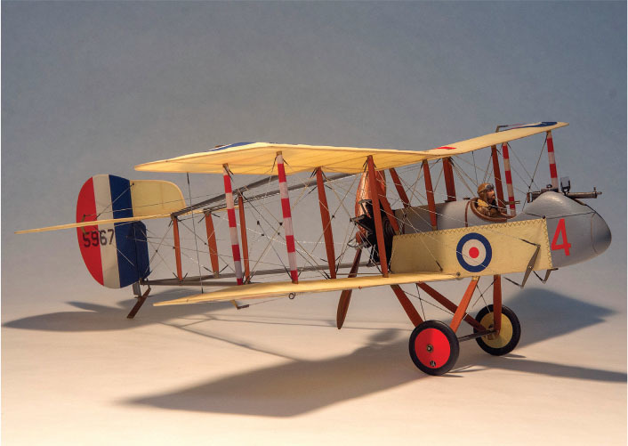 Model biplane with British roundel and "5967" on tail.