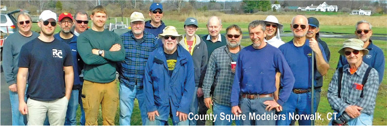 Group of people outdoors, "County Squire Modelers Norwalk, CT" text in corner.