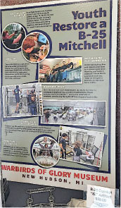 Youth restoring B-25 Mitchell at Warbirds of Glory Museum, New Hudson, MI.
