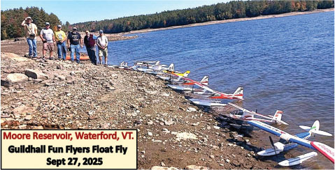 Seven people with model planes by Moore Reservoir, Waterford, VT. Event text: Sept 27, 2025.