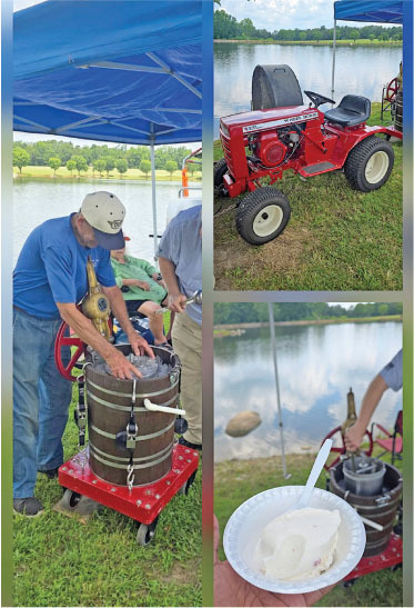 Man churns ice cream under a canopy. Red tractor nearby. Bowl of ice cream in hand. Lakeside setting.