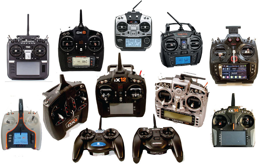 Various remote control devices, different designs and sizes, with antennas and screens.