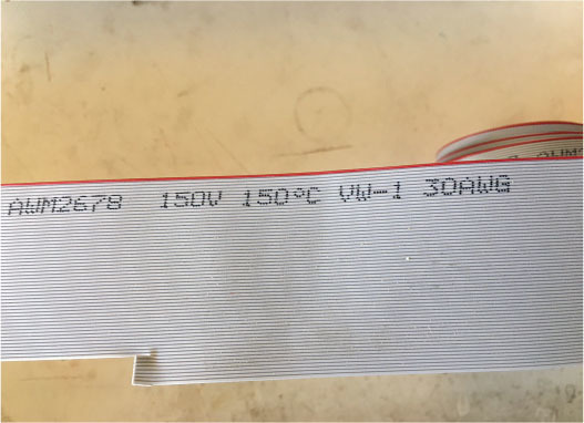 AWM 2678, 150V, 150°C, VW-1, 30AWG printed on flat cable.