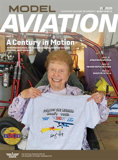 Model Aviation magazine cover, elderly woman smiling, holding aviation-themed shirt.