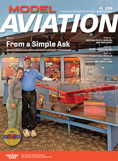 Model Aviation magazine cover with smiling couple beside a model aircraft.