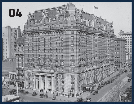 Historic photograph of a grand hotel building with ornate architecture.