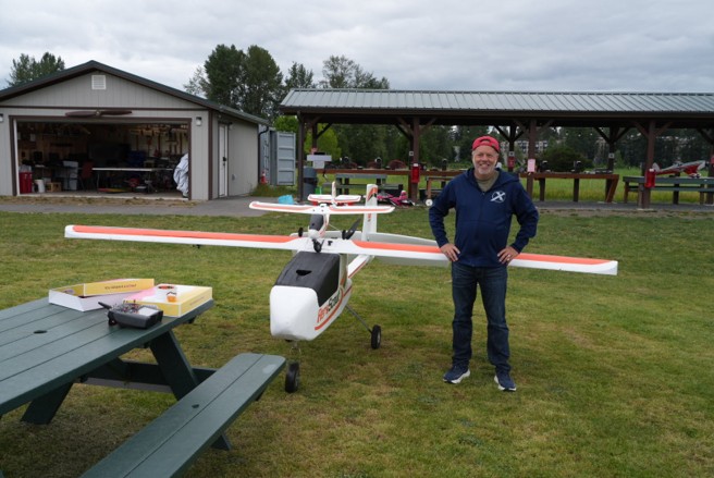 Chris standing in front of his giant AeroScout with donuts