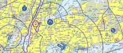 Aeronautical chart with symbols and yellow background.