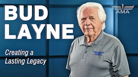 Bud Layne, older man in grey polo, AMA logo, text: "Creating a Lasting Legacy."