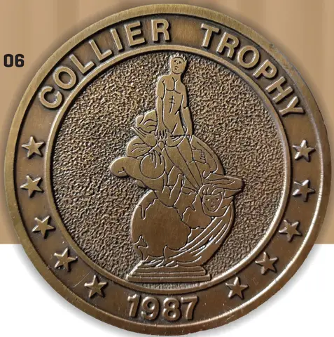 Bronze Collier Trophy medal, year 1987, with stars and figure design.