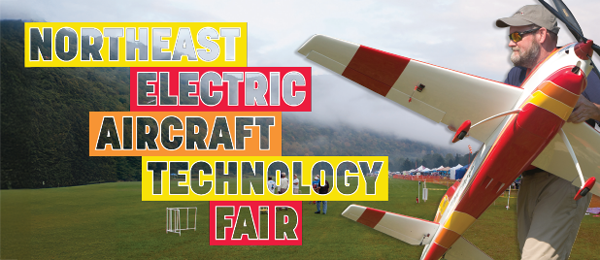 Northeast Electric Aircraft Technology Fair; man holding model plane.