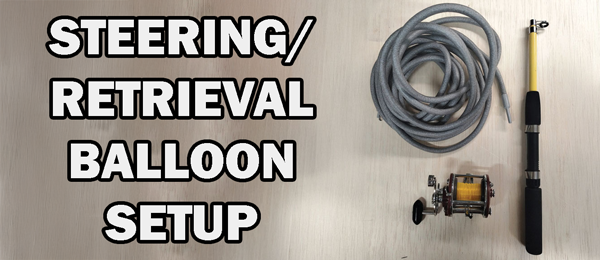 STEERING/RETRIEVAL BALLOON SETUP text with cord and equipment on a table.