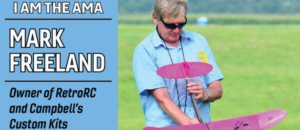 Man in blue shirt holds pink model plane; text: "I AM THE AMA, MARK FREELAND"