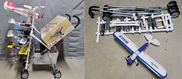 Two model airplanes on a cart, folded cart on the right.