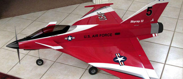 Red model jet with "U.S. Air Force" text, and number 5 on tail fin.