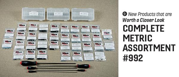 Complete Metric Assortment #992, hardware kits and tools displayed on a table.