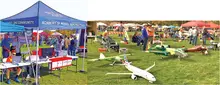 Outdoor model aircraft display; people under tents; group examining planes.
